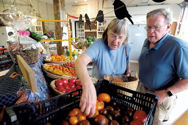 Dorrie and Keith Ellsworth of Northfield shopping for tomatoes at Green Mountain Girls farm store - JEB WALLACE-BRODEUR