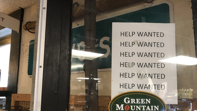 A sign at the Marshfield Village store