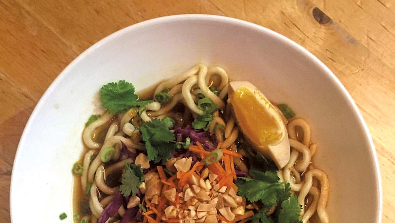 Handmade noodles with pickled duck egg and peanuts at Misery Loves Co.
