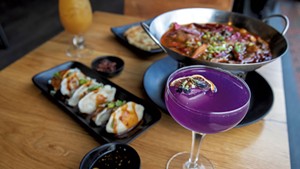 House cocktail with butterfly pea flower, Mongolian lamb with hot chile, scallion pancake and Sichuan spicy dumplings at Mandarin in Winooski