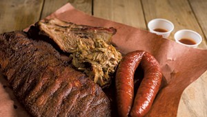 Smorgasbord of smoked meats: ribs, brisket, pulled pork and sausage