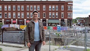 David Hohenschau in front of construction in downtown Middlebury