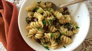 Pasta salad with beans, veggies and herbs