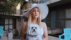 BARK CITY Keough plays the dog-loving object of a wannabe sleuth’s obsession in Mitchell’s hyperreal LA noir.
