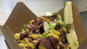 Smoked pastrami, yellow beer mustard and pickle poutine