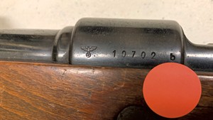 The Nazi Reichsadler emblem on a state-owned rifle