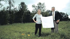 Amy Cooper and Dr. Tom Dowhan at the  site of the proposed surgical center
