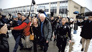 Sen. Bernie Sanders and Jane O'Meara Sanders outside a polling place in Manchester, N.H.
