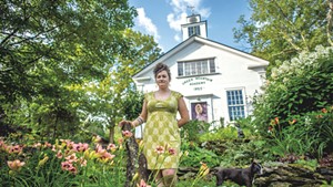 Gardener Jen Kennedy with her dog, Tobias, at home in Underhill