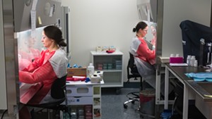 Workers at the Vermont Health Department lab