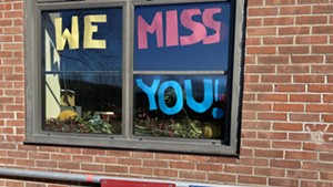 A sign in a window at the Hinesburg Community School
