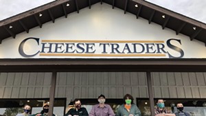 Cheese & Wine Traders team members wearing masks