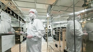 A GlobalFoundries employee working on the production floor in Essex Junction