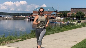 Katie Spotz finishing her run to the Burlington waterfront