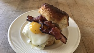 Egg and bacon sandwich on a maple biscuit