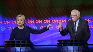 Hillary Clinton and Sen. Bernie Sanders debate Sunday night in Flint, Michigan.