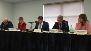 The Green Mountain Care Board split over how UVMMC and Central Vermont Medical Center should distribute excess revenues.