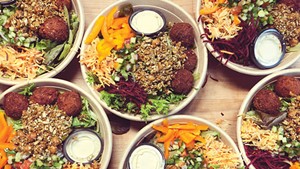 Honey Road falafel salads packed for takeout