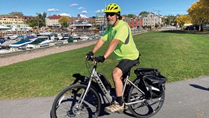 Ken Picard on a Local Motion e-bike on the Burlington Greenway
