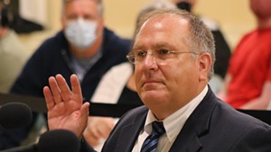 Gene Richards at his termination hearing last month