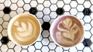 Uncommon Coffee's Cardamom & Smoke latte (left) and Ube latte