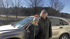 Tom Thompson with grandson Owen heading out on their last Meals on Wheels delivery in April