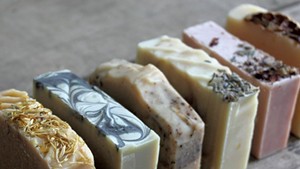 Homemade soaps decorated with dried flowers