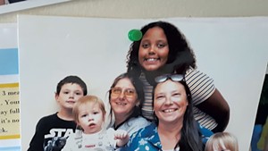Diane Deso (front, second from right) with grandchildren Kyle, Jamie and Autumn, and Family Room staff member Rosie Senna (with an unrelated child)