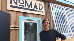 Andrew Sepic in front of the Nomad Coffee trailer