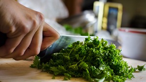Chopping curly parsley for gremolata