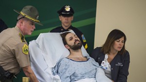 Steven Bourgoin is wheeled into his arraignment at the UVM Medical Center Friday morning.