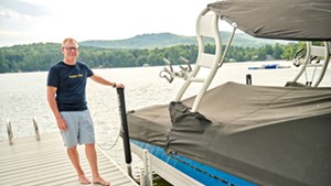Rodney Putnam and his wake boat on Lake Iroquois
