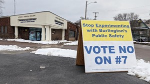 A "Vote No" sign near Burlington police headquarters