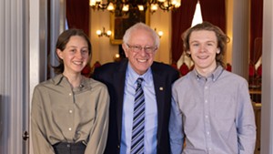 Twinfield Union School juniors August Howe, left, and Keenan Wallace with Sen. Bernie Sanders