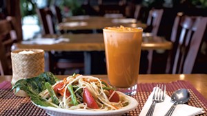 Som tam salad with Thai iced tea and a side of sticky rice