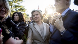 Hillary Clinton, accompanied by her husband, former President Bill Clinton, right, greeting supporters in Chappaqua, N.Y., after voting on Tuesday