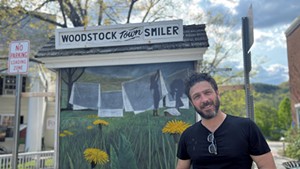 Artist Adrian Tans and his work on the Woodstock Town Smiler chalkboard