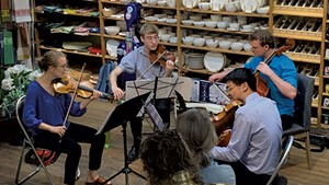A chamber quartet playing at Homeport