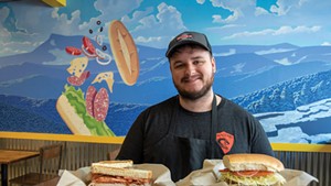 Noah Hodgdon with a Hotel California and a roast beef sub at Yellow Mustard Deli &amp; Sandwich Shop
