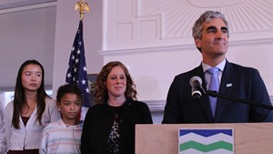 Mayor Miro Weinberger flanked by family on Thursday