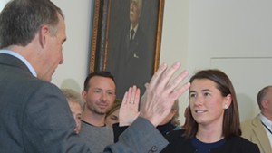 Gov. Phil Scott swears Sarah George in as Chittenden County state's attorney.
