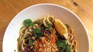 Handmade noodles with pickled duck egg and peanuts at Misery Loves Co.