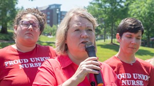 Deb Snell speaking at a press conference last month