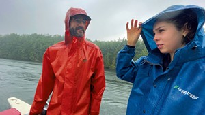 Nina Sablan with rowing coach Steve Hap Whelpley on Great Hosmer Pond, watching Olympic rower Jacob Plihal train in the rain &mdash; for 90 minutes!