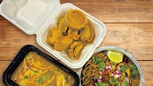 Clockwise from top: fried vegetable momos, Jhol vegetable momos, pork chow mein (table background made with AI)