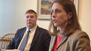 Mary Kate Mohlman, state director of health care reform, and Al Gobeille, secretary of the Agency of Human Services, talk to reporters Friday.