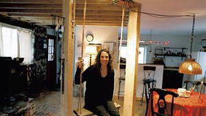 Stacy Hopkins in her jewelry studio, formerly a blacksmith shop