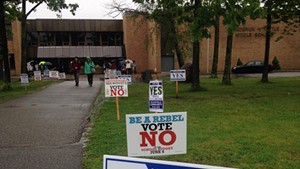 Signs outside Frederick H. Tuttle Middle School in South Burlington Tuesday