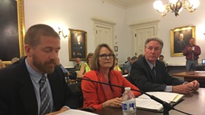 Public Service Board utilities analyst Tom Knauer (left), PSB member Margaret Cheney and PSB staff attorney John Cotter testify before LCAR on Thursday.