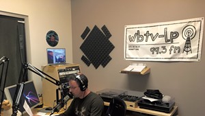 WBTV-LP DJ Adam Rabin recording a show at the station's studio